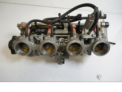 Framsidan på Spjällhus från en Honda CBR 600 RR -2003 motorcykel.