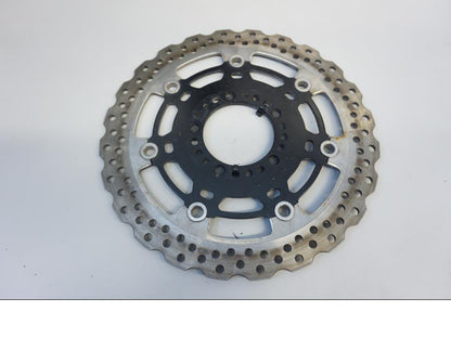 Framsidan på Bromsskiva från en Kawasaki Versys 1000 -2015 motorcykel.