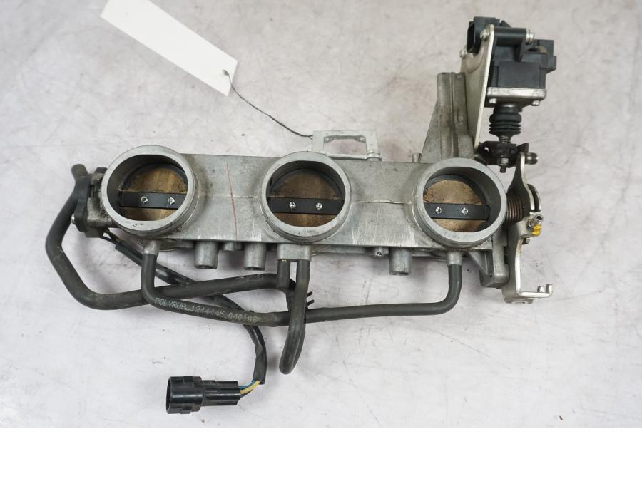 Extrabild1 på Spjällhus från en Triumph Tiger -2009 motorcykel.