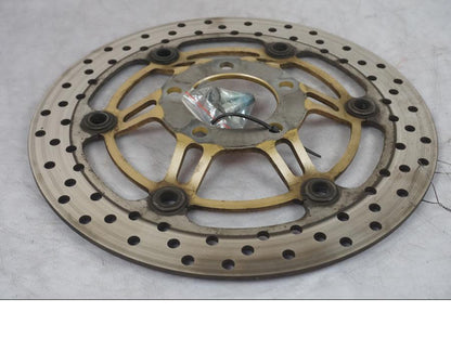 Vänster sida på Bromsskiva från en Suzuki SV 650 -1999 motorcykel.