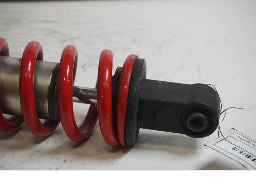 Baksidan på Stötdämpare från en Triumph Speed Triple -2011 motorcykel.