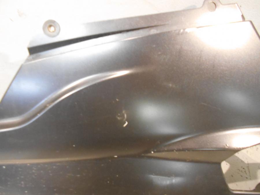 Vänster sida på Magkåpa från en Ducati 848 -2013 motorcykel.