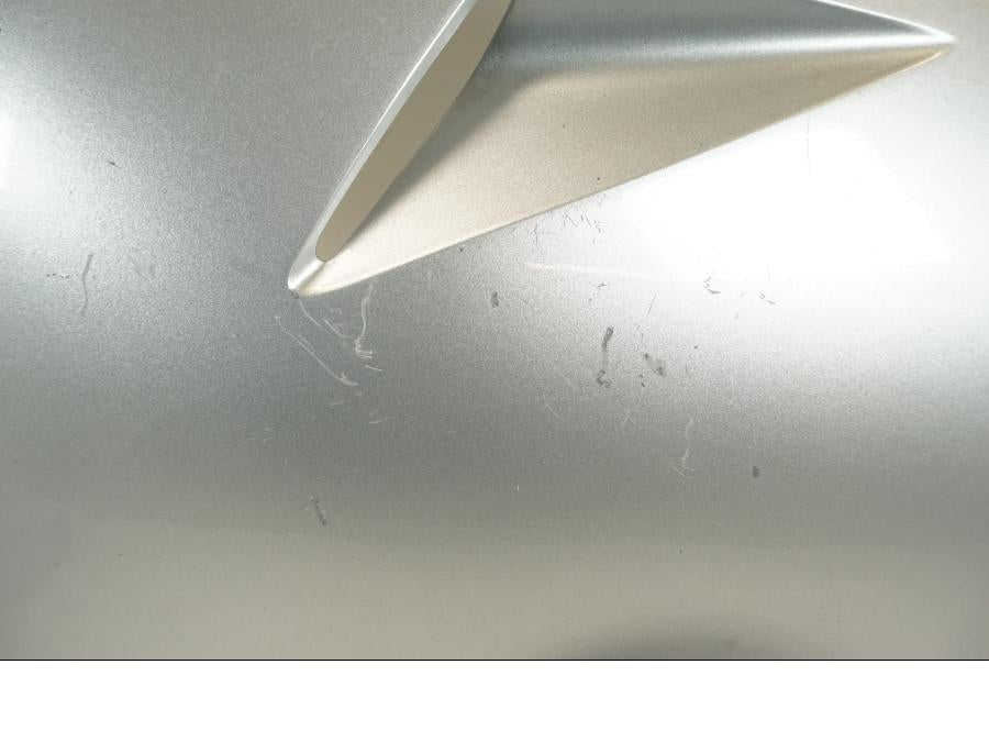 Vänster sida på Sidkåpa från en Honda VFR 800 -2003 motorcykel.