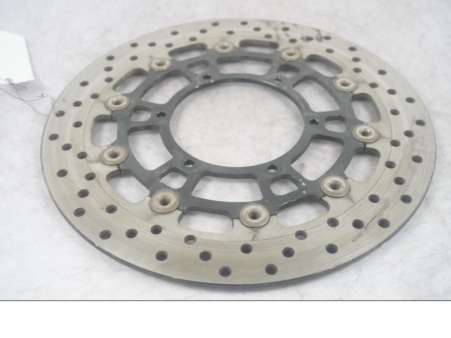Höger sida på Bromsskiva från en BMW F 700 GS -2014 motorcykel.