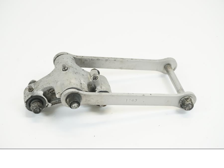 Vänster sida på Stötdämparlänkage från en Kawasaki ZX-12R -2000 motorcykel.