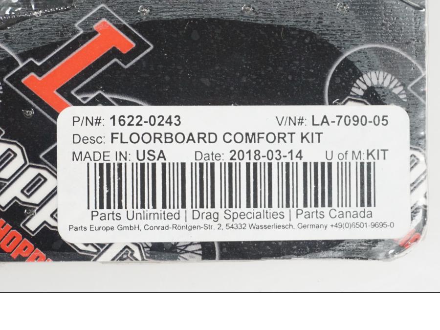 Vänster sida på Fotplattefäste från en H-D Street Glide FLHX -2020 motorcykel.