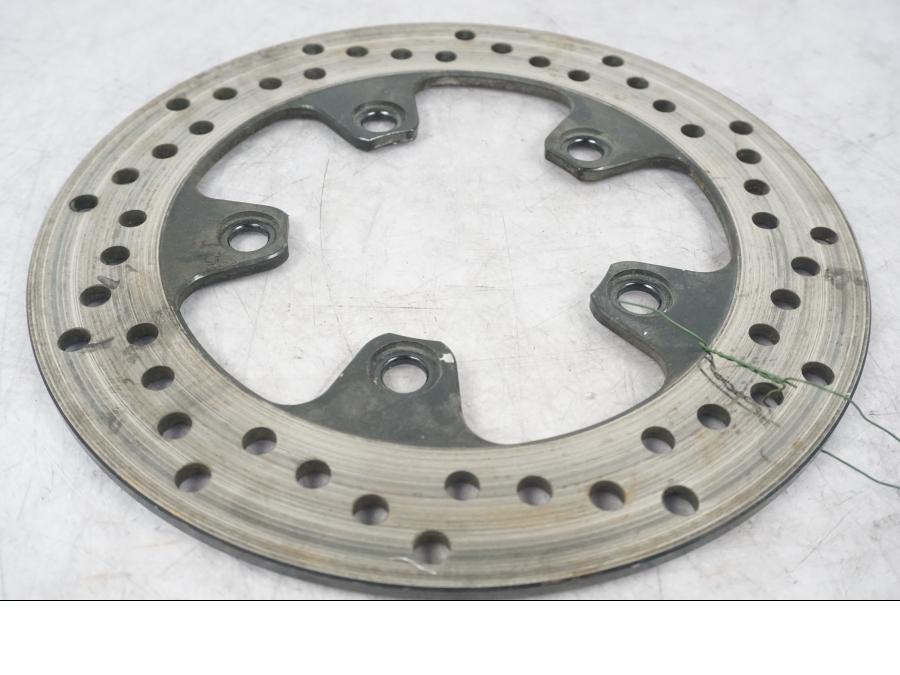 Höger sida på Bromsskiva från en Suzuki SV 650 -2006 motorcykel.