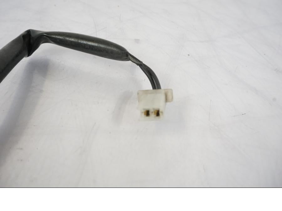 Vänster sida på Bromsljuskontakt från en Honda CBR 125 R -2006 motorcykel.