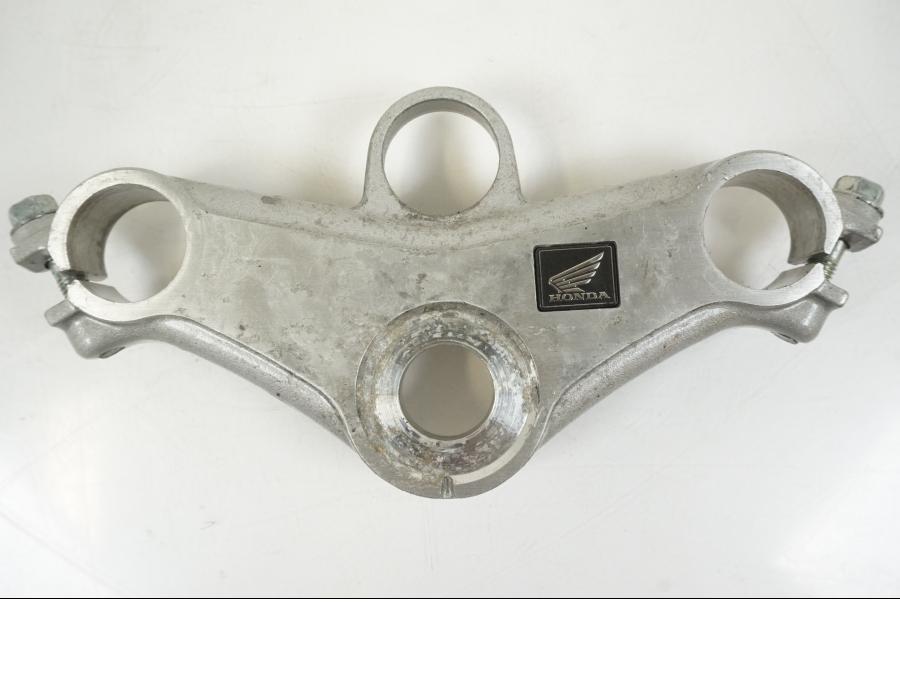 Framsidan på Gaffelkrona från en Honda CBR 125 R -2006 motorcykel.