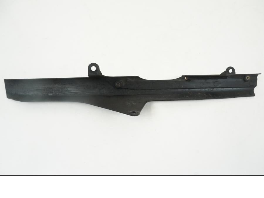 Snett uppifrån på Kedjeskydd från en Triumph Speed Triple -2009 motorcykel.