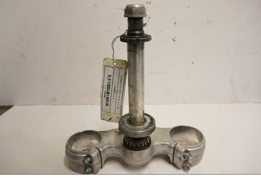 Framsidan på Gaffelkrona från en Husaberg FE 02 -2004 motorcykel.