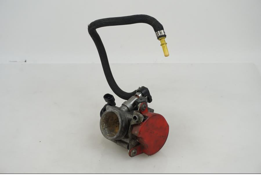 Framsidan på Spjällhus från en Gasgas SM450 -2007 motorcykel.