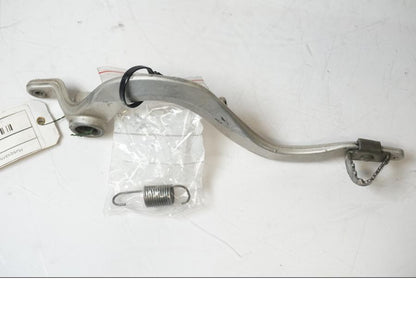 Baksidan på <p>Bromspedal från Husqvarna TE 310 2009.</p>

<p>Skavmärke finns se bild.</p> motorcykel.