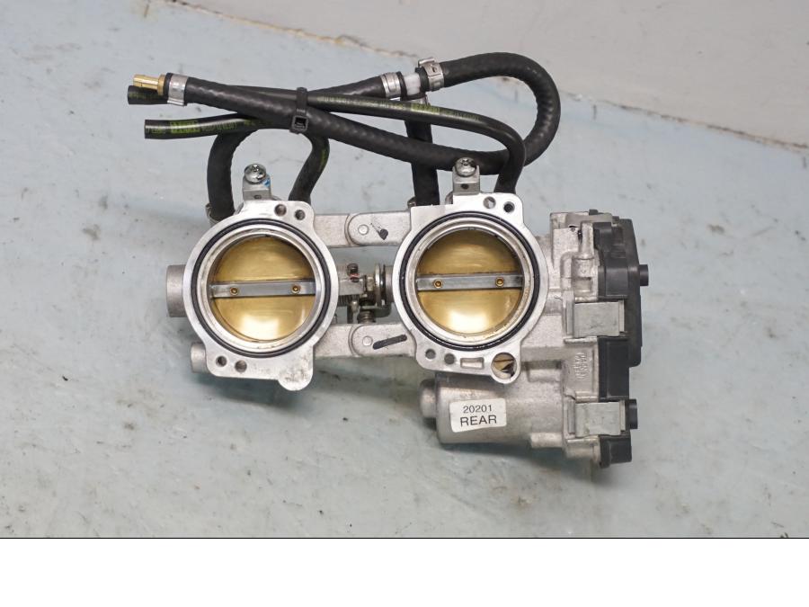 Framsidan på Spjällhus från en Aprilia Tuono V4R -2018 motorcykel.