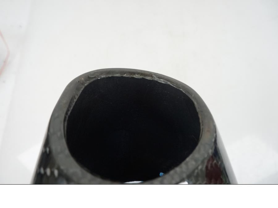 Vänster sida på Ljuddämpare Sport från en Universal Universal -2008 motorcykel.