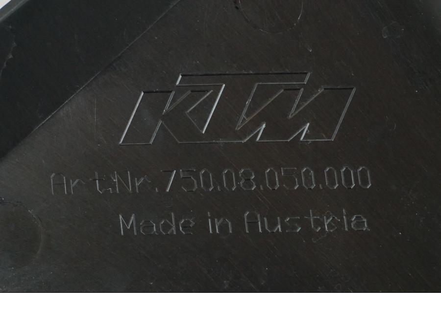 Vänster sida på Sidkåpa från en KTM 690 SM R -2009 motorcykel.
