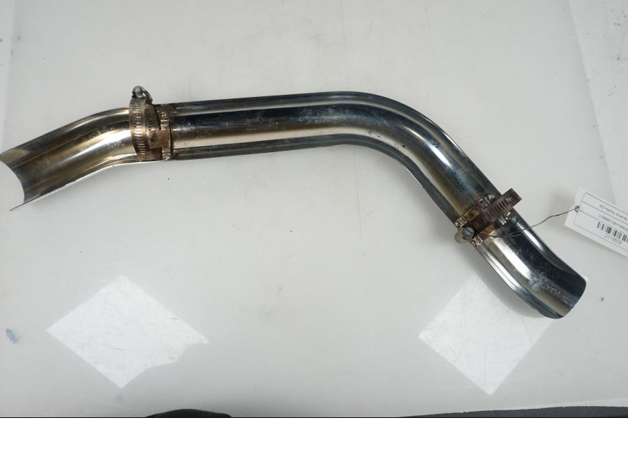 Baksidan på Värmeskydd från en H-D Harley diverse -2001 motorcykel.