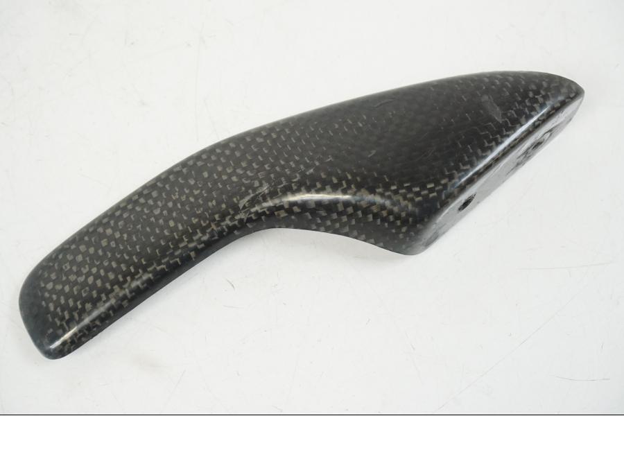 Framsidan på Kedjeskydd från en Aprilia RS 125 -2008 motorcykel.