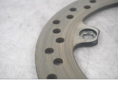 Baksidan på Bromsskiva från en Triumph Daytona 600 -2003 motorcykel.