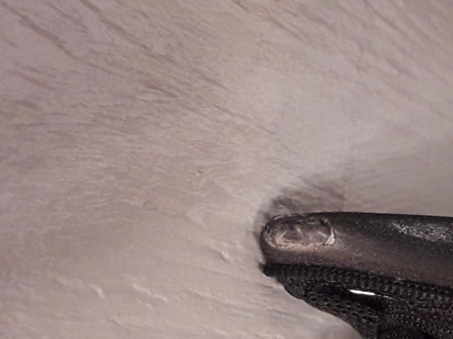 Snett nerifrån på Sadel från en Yamaha MT 125 -2017 motorcykel.