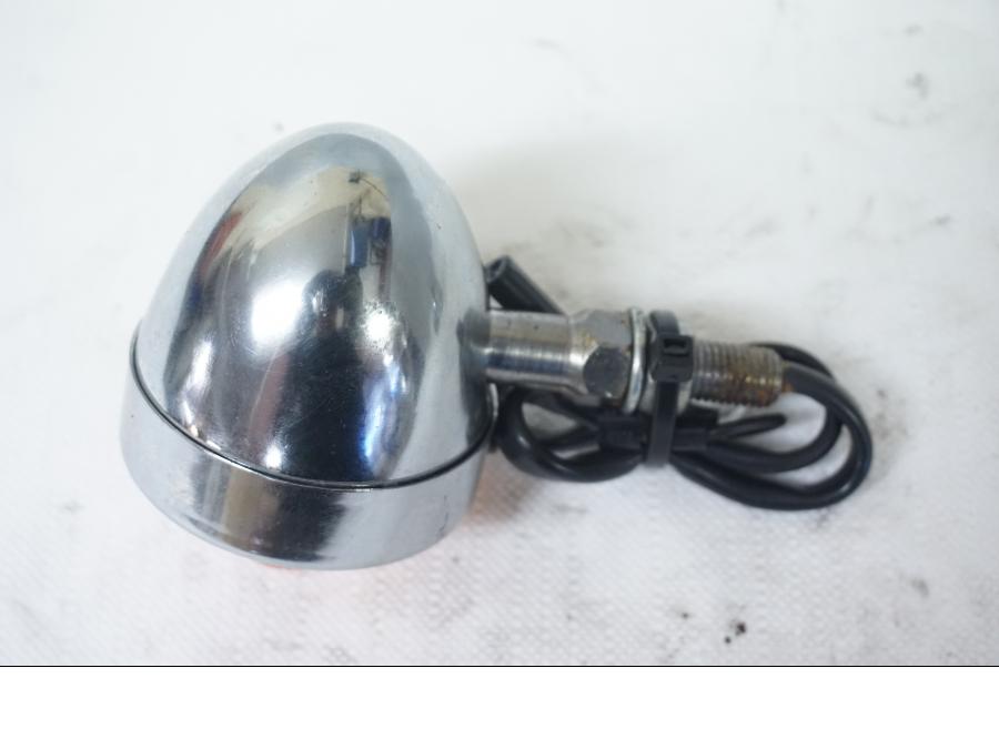 Höger sida på Blinkers från en Triumph Bonneville -2001 motorcykel.