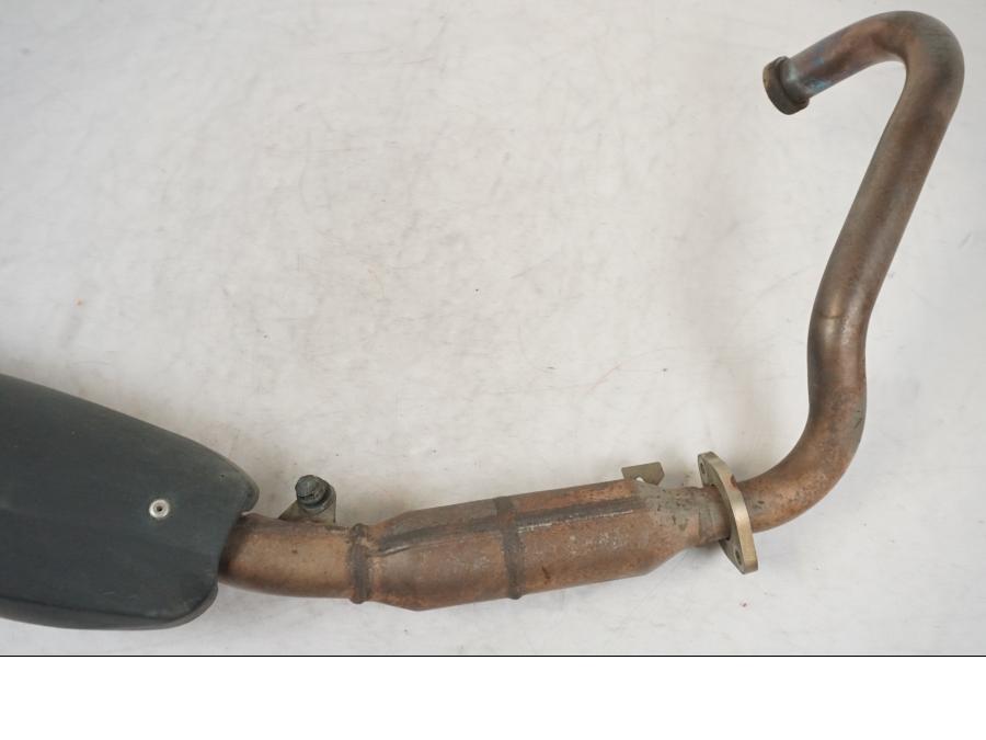 Baksidan på Avgassystem från en Yamaha MT 125 -2017 motorcykel.