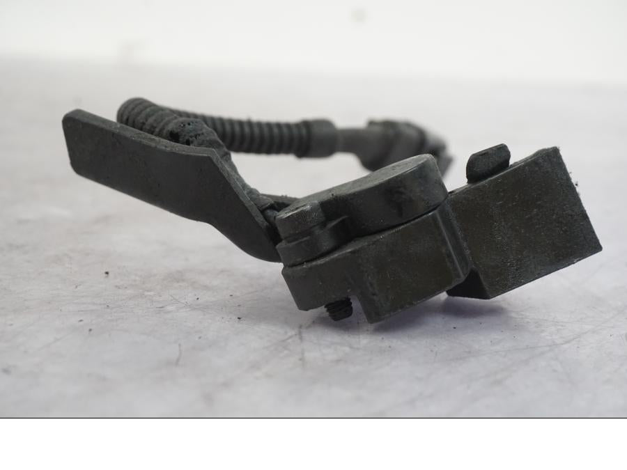 Snett uppifrån på Sidostödsbrytare från en Buell 1125 R -2008 motorcykel.