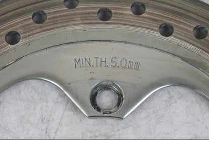 Baksidan på Bromsskiva från en Triumph Tiger -2009 motorcykel.