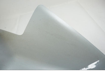 Snett nerifrån på Ljuddämpardekor från en Aprilia RS 660 -2022 motorcykel.