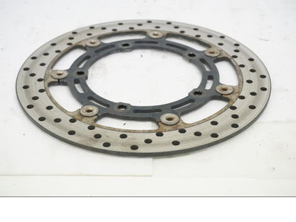 Framsidan på Bromsskiva från en Yamaha MT-03 -2007 motorcykel.