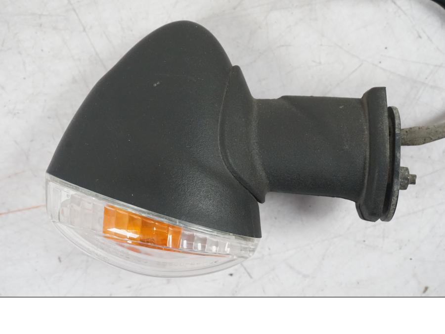 Vänster sida på Blinkers från en Suzuki GSF 1250 -2010 motorcykel.