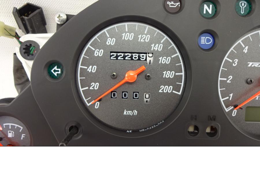 Vänster sida på Instrumentpanel från en Honda XL 650 V -2007 motorcykel.