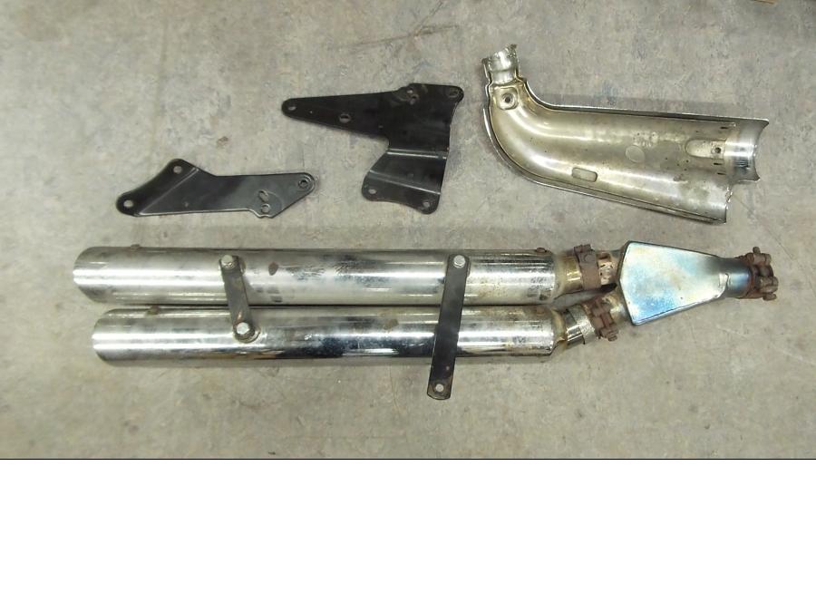 Snett uppifrån på Ljuddämpare Sport från en Triumph Rocket III -2007 motorcykel.