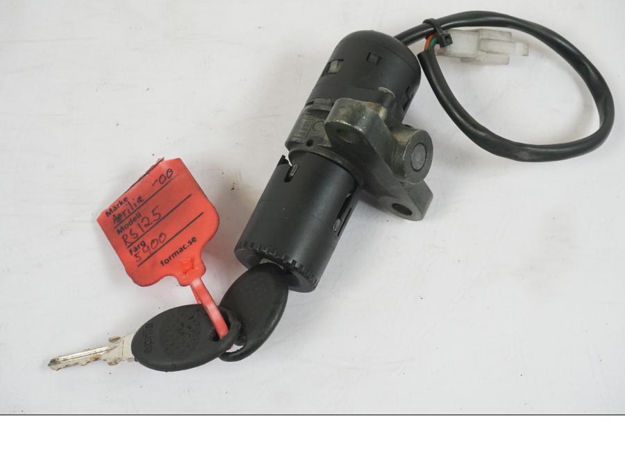 Baksidan på Låssats från en Aprilia RS 125 -2000 motorcykel.
