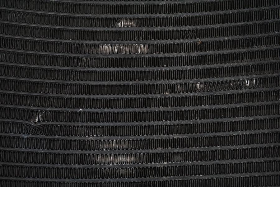 Baksidan på Vattenkyl från en Suzuki GSX-R 750 -2009 motorcykel.