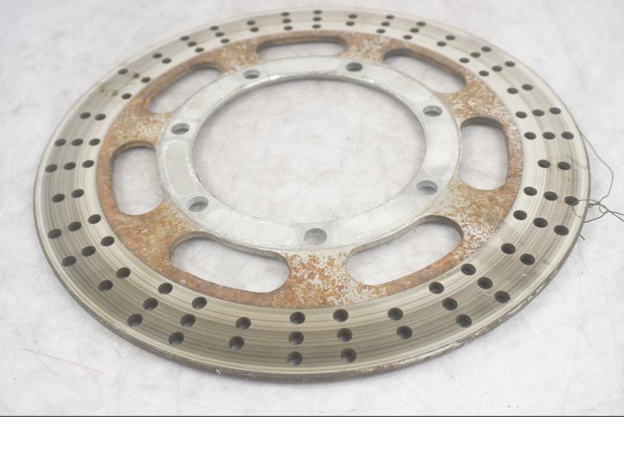 Framsidan på Bromsskiva från en Kawasaki VN 800 -1995 motorcykel.