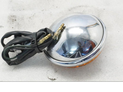 Baksidan på Blinkers från en Yamaha XVS 650 -1999 motorcykel.