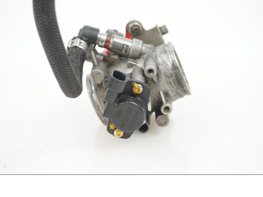 Snett nerifrån på Spjällhus från en Gasgas SM450 -2007 motorcykel.