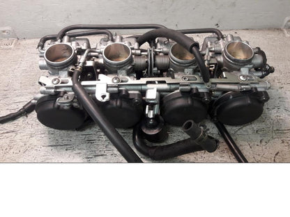 Baksidan på Förgasare från en Yamaha FZ-S 600 -2000 motorcykel.