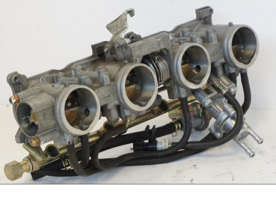 Höger sida på Spjällhus från en Honda CBR 900 RR -2001 motorcykel.