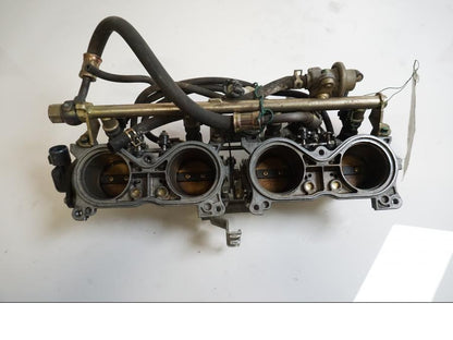 Baksidan på Spjällhus från en Honda CBR 900 RR -2000 motorcykel.