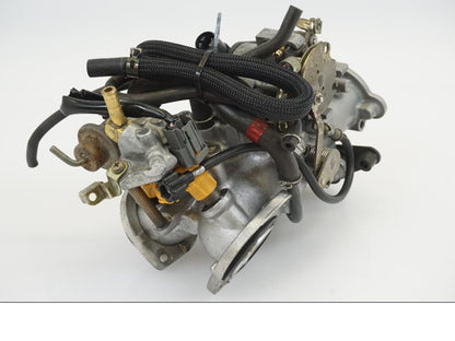 Vänster sida på Spjällhus från en Kawasaki VN 1500 Classic Tourer -2000 motorcykel.