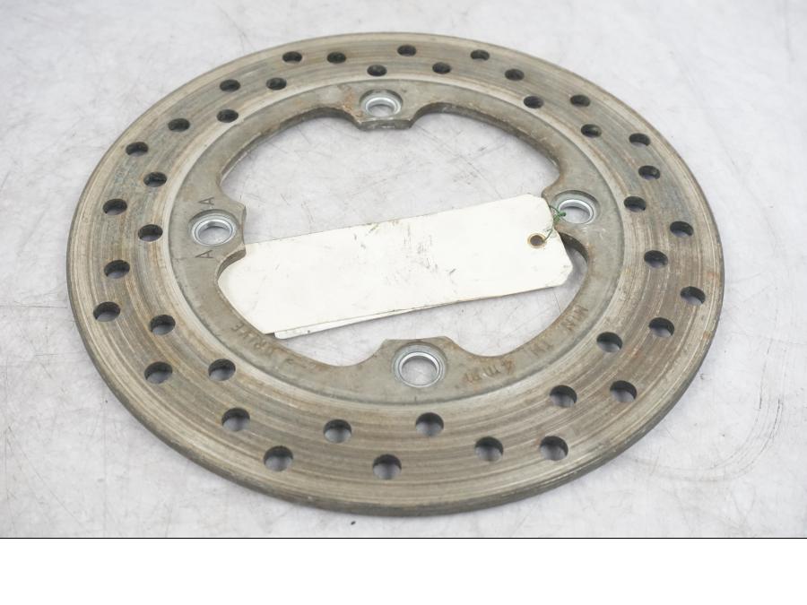 Vänster sida på Bromsskiva från en Honda CBR 600 -2002 motorcykel.