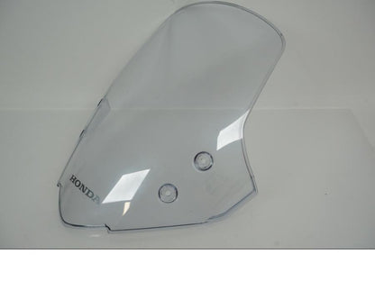 Vänster sida på Vindruta från en Honda NC 750 X -2015 motorcykel.