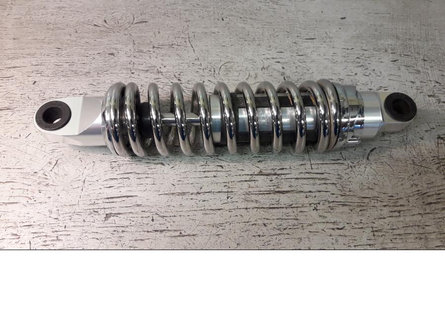 Framsidan på Stötdämpare från en H-D Harley diverse -2010 motorcykel.