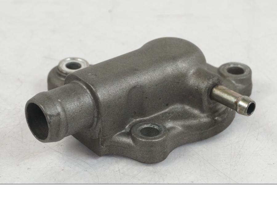 Baksidan på Vattenpump från en Honda CBR 125 R -2006 motorcykel.