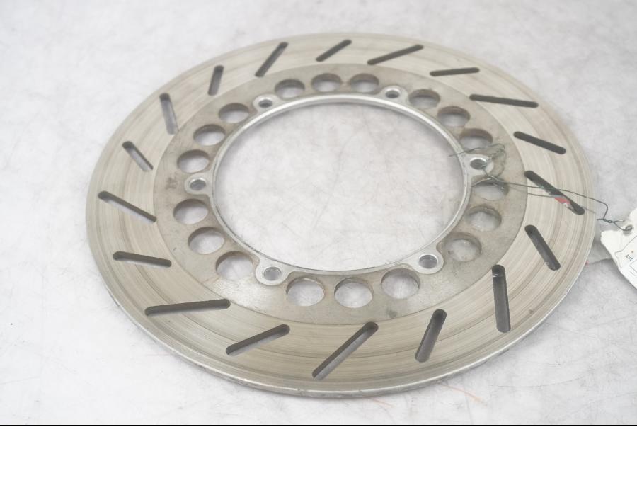 Framsidan på Bromsskiva från en Yamaha XV 1100 -1992 motorcykel.