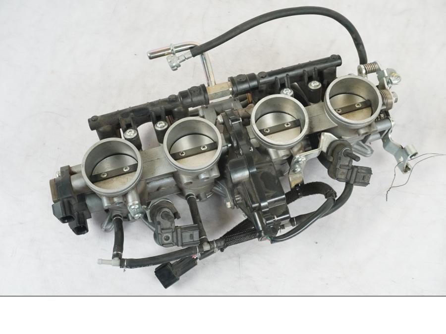 Framsidan på Spjällhus från en Kawasaki Z 900 -2019 motorcykel.