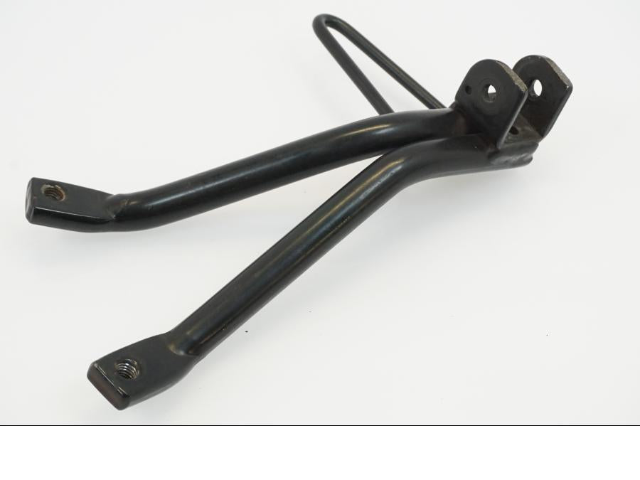 Baksidan på Fotpinnefäste från en Yamaha WR 125 -2010 motorcykel.