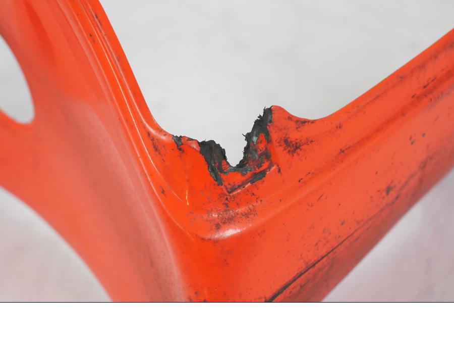 Baksidan på Magkåpa från en Aprilia RS 125 -2000 motorcykel.